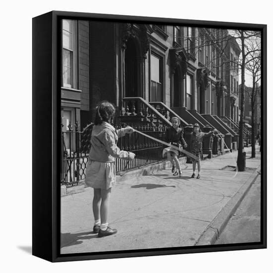 Children Jump Roping on Sidewalk Next to Brooklyn Brownstones, NY, 1949-Ralph Morse-Framed Premier Image Canvas