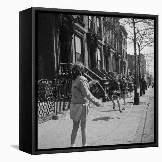 Children Jump Roping on Sidewalk Next to Brooklyn Brownstones, NY, 1949-Ralph Morse-Framed Premier Image Canvas
