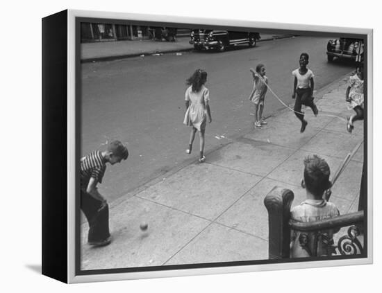 Children Jumping Rope on Sidewalk-Ed Clark-Framed Premier Image Canvas