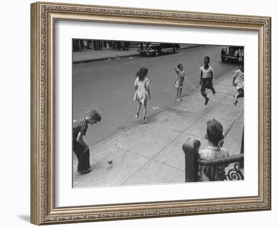 Children Jumping Rope on Sidewalk-Ed Clark-Framed Photographic Print