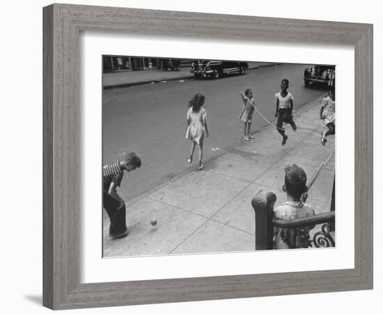 Children Jumping Rope on Sidewalk-Ed Clark-Framed Photographic Print