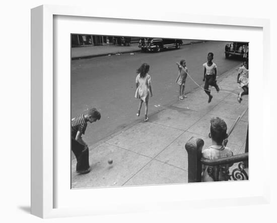 Children Jumping Rope on Sidewalk-Ed Clark-Framed Photographic Print