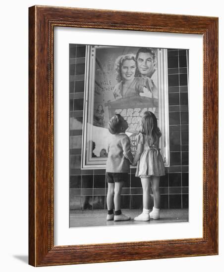 Children Looking at Posters Outside Movie Theater-Charles E^ Steinheimer-Framed Photographic Print