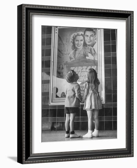 Children Looking at Posters Outside Movie Theater-Charles E^ Steinheimer-Framed Photographic Print