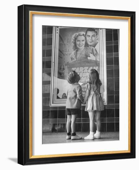 Children Looking at Posters Outside Movie Theater-Charles E^ Steinheimer-Framed Photographic Print