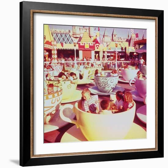 Children on Giant Teacup Ride at Walt Disney's Theme Park, Disneyland-Allan Grant-Framed Photographic Print