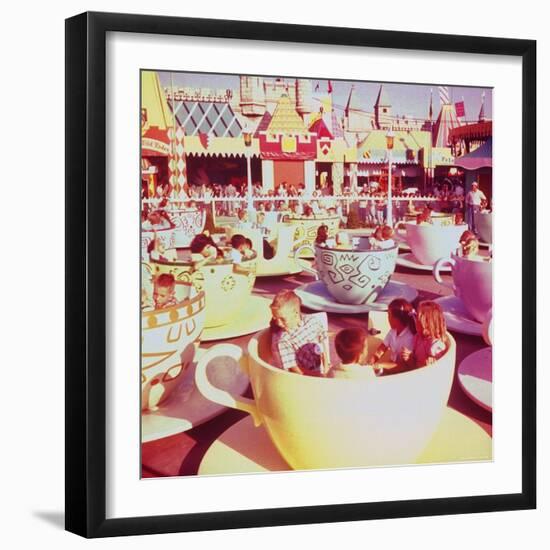 Children on Giant Teacup Ride at Walt Disney's Theme Park, Disneyland-Allan Grant-Framed Photographic Print