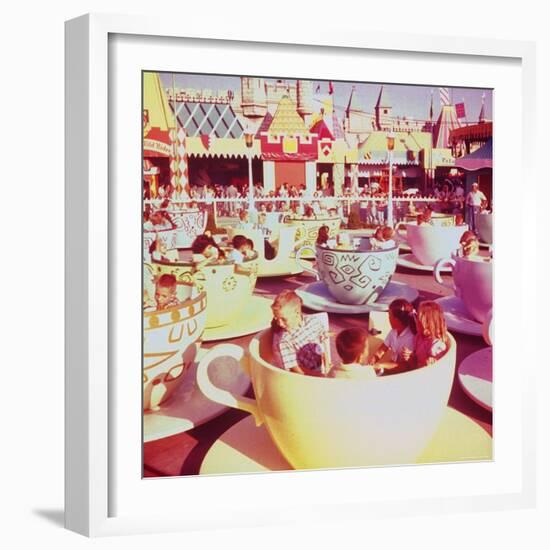 Children on Giant Teacup Ride at Walt Disney's Theme Park, Disneyland-Allan Grant-Framed Photographic Print