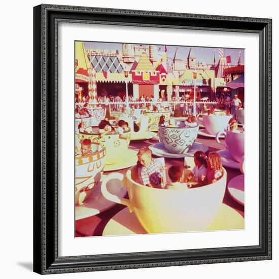 Children on Giant Teacup Ride at Walt Disney's Theme Park, Disneyland-Allan Grant-Framed Photographic Print