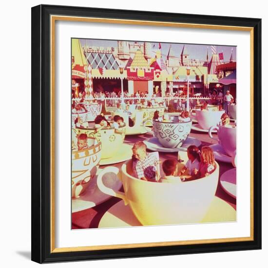 Children on Giant Teacup Ride at Walt Disney's Theme Park, Disneyland-Allan Grant-Framed Photographic Print