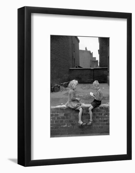 Children play cards in a shabby backyard in Bytom,1956.-Erich Lessing-Framed Photographic Print