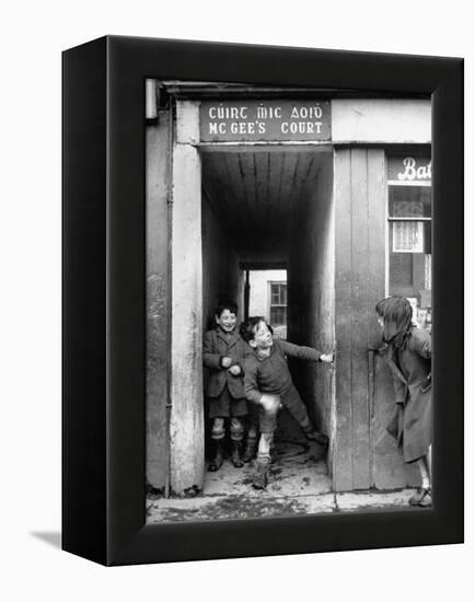 Children Playing at the Entrance to McGee's Court Slum on Camden Street-Tony Linck-Framed Premier Image Canvas