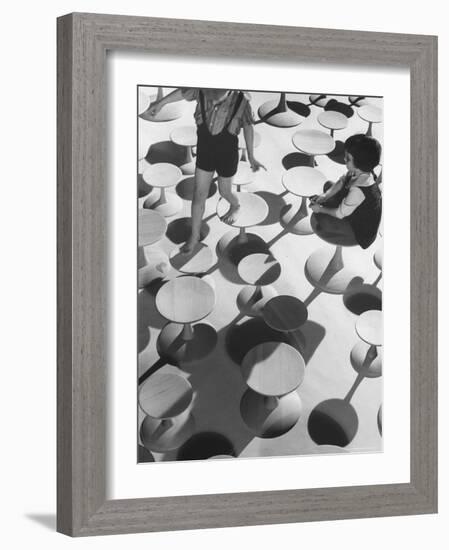 Children Playing Atop Modern Furniture-Michael Rougier-Framed Photographic Print