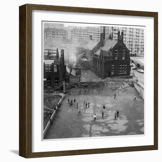 Children Playing in a Playground in Sheffield-Henry Grant-Framed Photographic Print