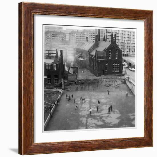 Children Playing in a Playground in Sheffield-Henry Grant-Framed Photographic Print