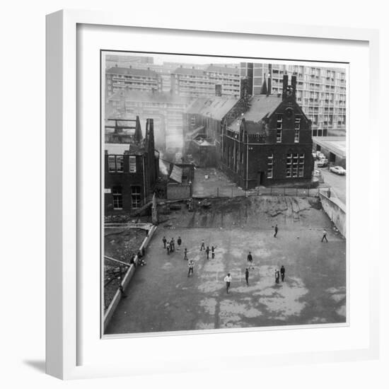 Children Playing in a Playground in Sheffield-Henry Grant-Framed Photographic Print