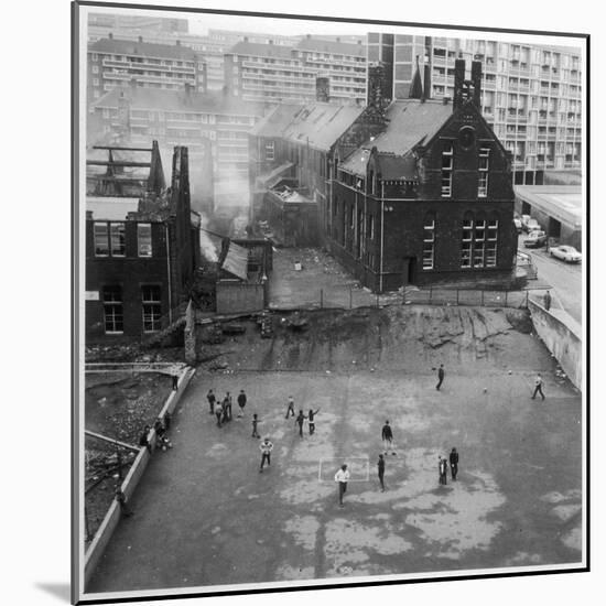 Children Playing in a Playground in Sheffield-Henry Grant-Mounted Photographic Print
