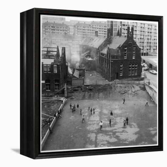 Children Playing in a Playground in Sheffield-Henry Grant-Framed Premier Image Canvas