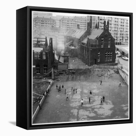 Children Playing in a Playground in Sheffield-Henry Grant-Framed Premier Image Canvas