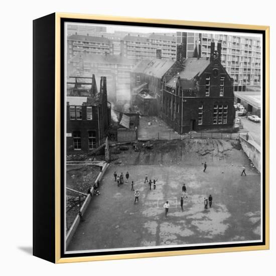 Children Playing in a Playground in Sheffield-Henry Grant-Framed Premier Image Canvas