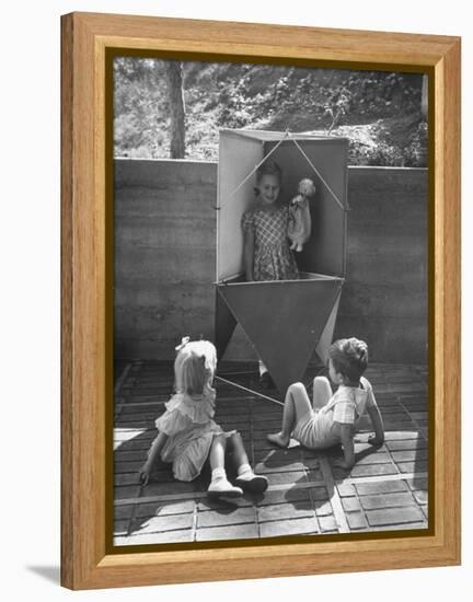 Children Playing in a Toy Made by Charles Eames-Allan Grant-Framed Premier Image Canvas