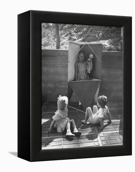 Children Playing in a Toy Made by Charles Eames-Allan Grant-Framed Premier Image Canvas