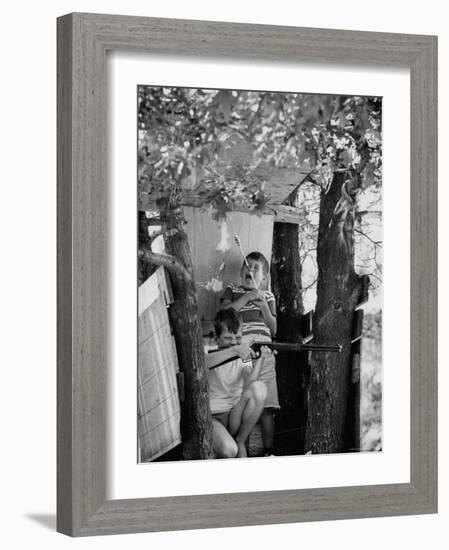 Children Playing in a Treehouse-Arthur Schatz-Framed Photographic Print