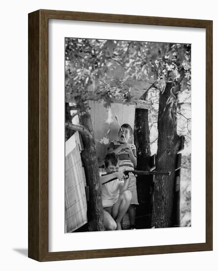 Children Playing in a Treehouse-Arthur Schatz-Framed Photographic Print