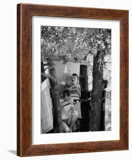 Children Playing in a Treehouse-Arthur Schatz-Framed Photographic Print