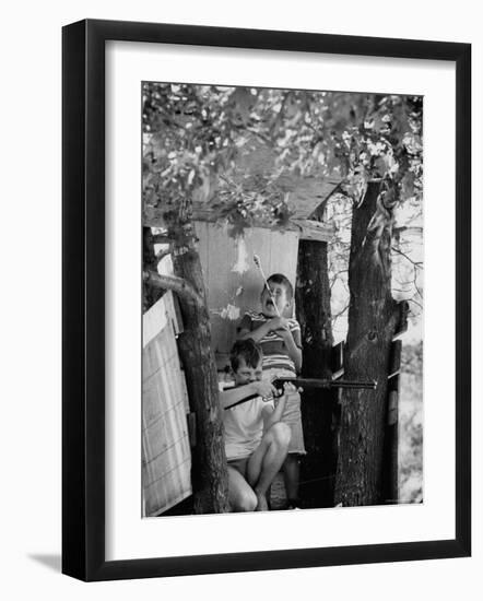 Children Playing in a Treehouse-Arthur Schatz-Framed Photographic Print