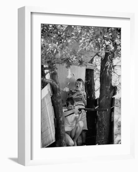 Children Playing in a Treehouse-Arthur Schatz-Framed Photographic Print