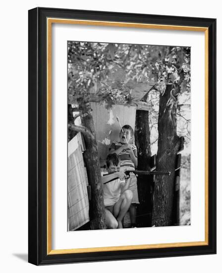 Children Playing in a Treehouse-Arthur Schatz-Framed Photographic Print