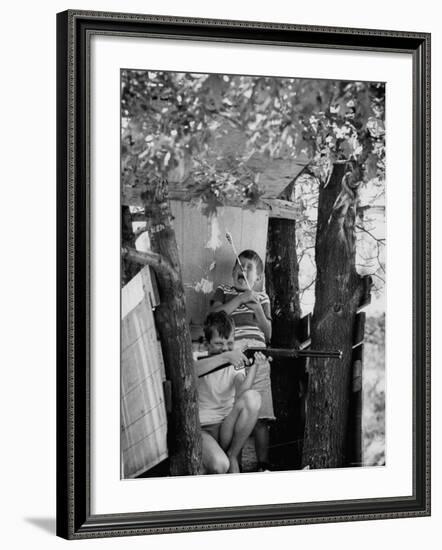 Children Playing in a Treehouse-Arthur Schatz-Framed Photographic Print