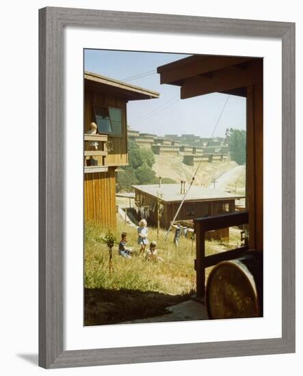 Children Playing in Backyard in Government Housing Project for Bechtel-Managed Shipyards Workers-Andreas Feininger-Framed Premium Photographic Print