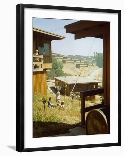 Children Playing in Backyard in Government Housing Project for Bechtel-Managed Shipyards Workers-Andreas Feininger-Framed Premium Photographic Print