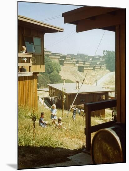 Children Playing in Backyard in Government Housing Project for Bechtel-Managed Shipyards Workers-Andreas Feininger-Mounted Premium Photographic Print