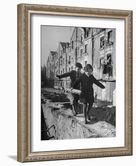 Children Playing-Nat Farbman-Framed Photographic Print