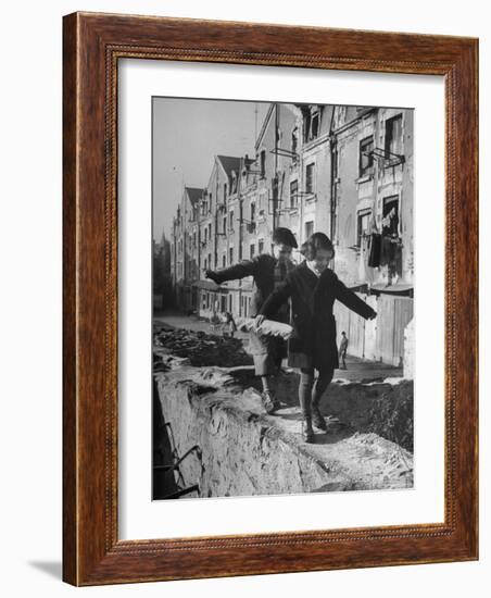 Children Playing-Nat Farbman-Framed Photographic Print