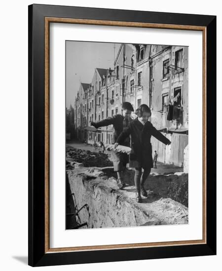 Children Playing-Nat Farbman-Framed Photographic Print