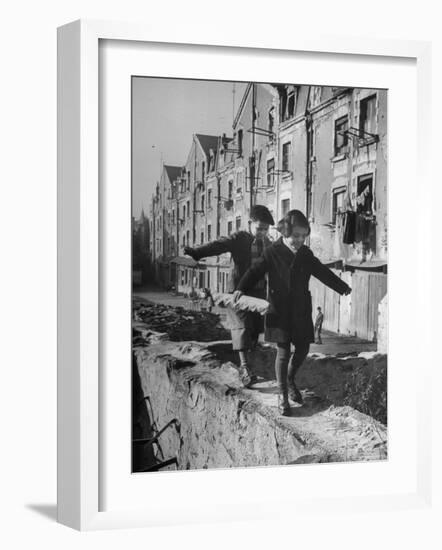 Children Playing-Nat Farbman-Framed Photographic Print