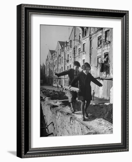 Children Playing-Nat Farbman-Framed Photographic Print