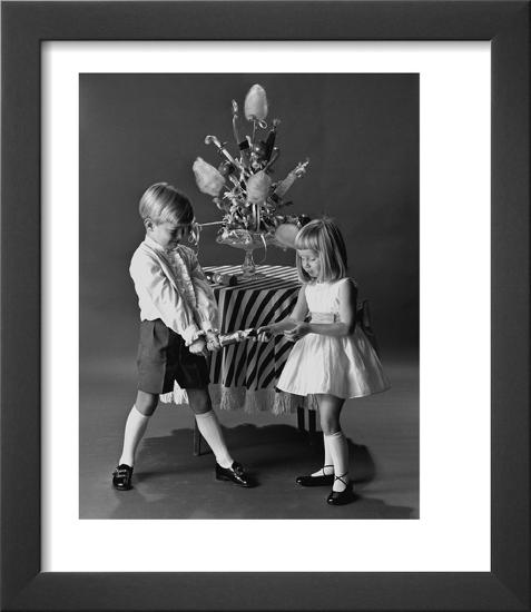 Children Pulling a Christmas Cracker, 1962-John French-Framed Art Print