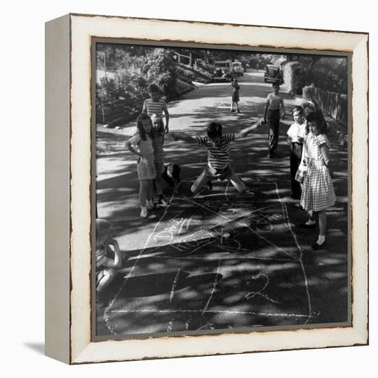 Children's Games-Ralph Morse-Framed Premier Image Canvas