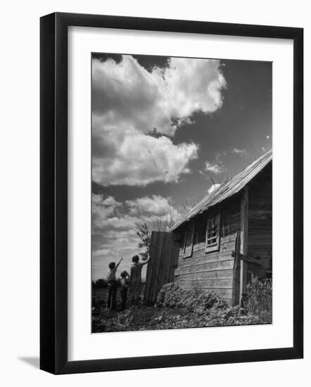 Children Searching the Sky Looking for Rain Clouds Outside Farmhouse During Drought in the Midwest-Margaret Bourke-White-Framed Photographic Print
