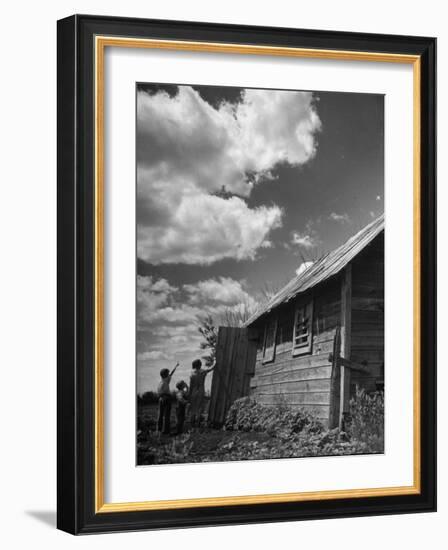 Children Searching the Sky Looking for Rain Clouds Outside Farmhouse During Drought in the Midwest-Margaret Bourke-White-Framed Photographic Print