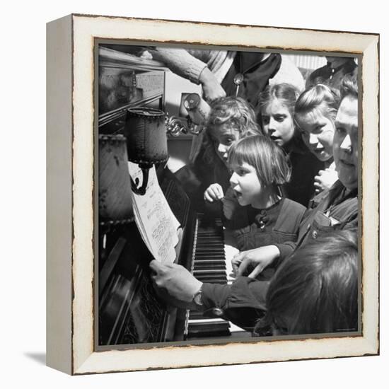 Children Singing Around the Piano at Orphanage-Tony Linck-Framed Premier Image Canvas