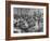 Children Sitting at their Desks in a Classroom, Teachers at the Rear of the Room-null-Framed Photographic Print