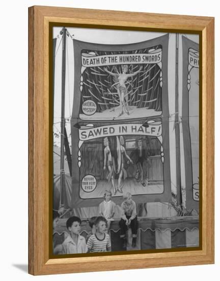 Children Sitting in Front of Banners for Magic Show Being Performed by Orson Welles-Peter Stackpole-Framed Premier Image Canvas