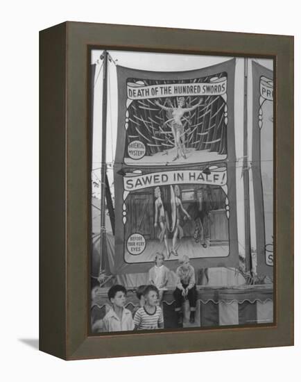 Children Sitting in Front of Banners for Magic Show Being Performed by Orson Welles-Peter Stackpole-Framed Premier Image Canvas