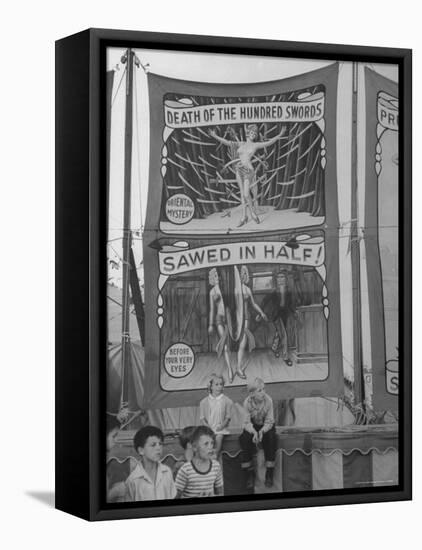 Children Sitting in Front of Banners for Magic Show Being Performed by Orson Welles-Peter Stackpole-Framed Premier Image Canvas